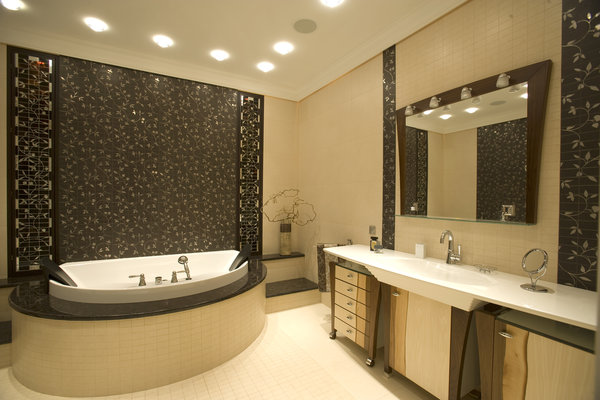 Modern bathroom renovation. Tiles, bath tub, and a vanity were installed in this beautiful luxury Burnaby home.